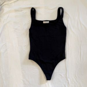Babaton Soft, Stretchy Thong Bodysuit size small.